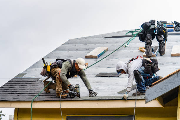 Professional Storm Damage Roof Repair technician working in New Hyde Park, NY